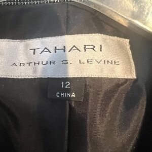 Tahari Black pattern jacket and skirt.